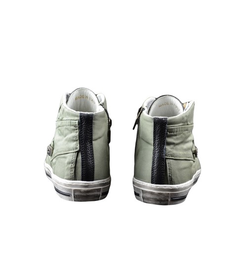 Handmade sneaker black leather and green color.